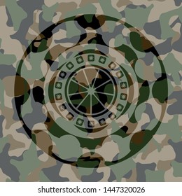 orange icon on camo pattern