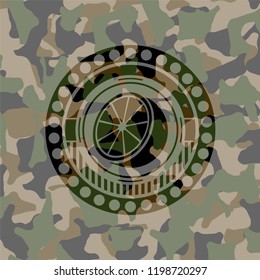 orange icon on camo texture