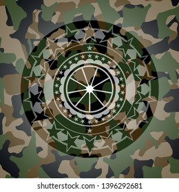 orange icon on camo texture