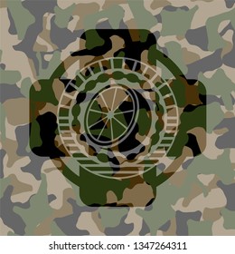 orange icon on camouflage pattern
