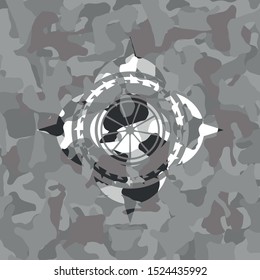 orange icon on grey camo texture