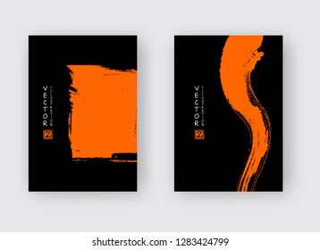 Orange ink brush stroke on black background. Japanese style. Vector illustration of grunge abstract stains.