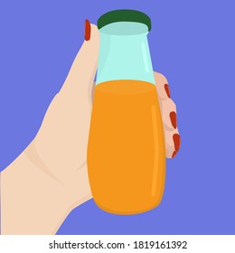 orange juice bottle in hand
