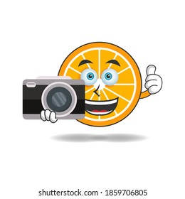 Orange mascot character holding camera. vector illustration