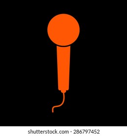 Orange microphone icon  on a black background