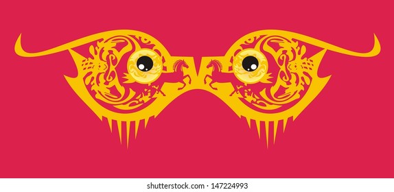 Orange monster eyes on a red background - a mask