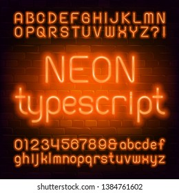 Orange neon alphabet font. Uppercase and lowercase. Light bulb letters and numbers. Stock vector typeface for your typography design. Brick wall background.