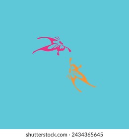 orange and pink butterflies flying in the air