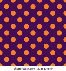 Orange polka dots, seamless pattern on purple background. Vector illustration. Happy Halloween.