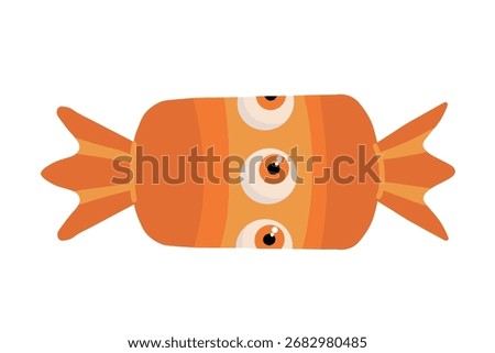 Orange pumpkin candy with eye on wrapper for Halloween