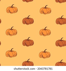 orange pumpkin on yellow background autumn seamless pattern