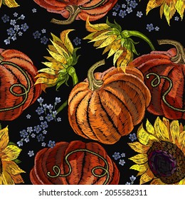 Orange pumpkin and yellow sunflowers flowers . Embroidery seamless pattern. Halloween gothic background. Template for clothes, t-shirt design 