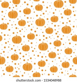 Orange pumpkins and dots on white background. Halloween, october seamless repeat vector pattern. For print and textile design. Vector.