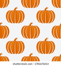 Orange pumpkins on white background seamless pattern