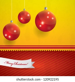 Orange and red Christmas background with hanging shiny Christmas balls