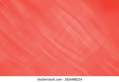 Orange red cloth is wrinkled in a thin wave.