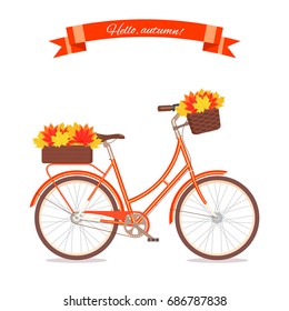 Orange retro bicycle with autumn leaves in floral basket and box on trunk. Color bike isolated on white background. Flat vector illustration of cycle.