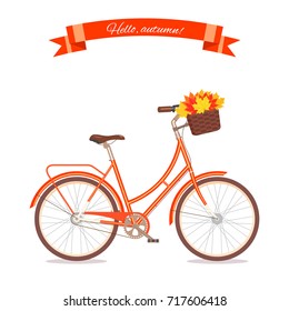 Orange retro bicycle with autumn leaves in floral basket and box on trunk. Color bike isolated on white background. Flat vector illustration of cycle with leaves.