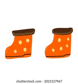 Orange rubber boots with polka dots.