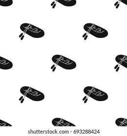 Orange rubber lifeboat.The boat, which weighs on the sides of large boats for the rescue.Ship and water transport single icon in black style vector symbol stock illustration.