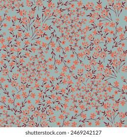 orange seamless floral vector small flowers leaves pattern on green background