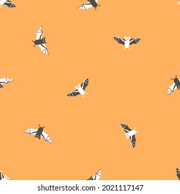 Orange seamless pattern of cute vampire bats. Vector childish hand drawn illustration for Halloween