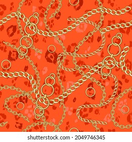 Orange seamless pattern gold chains on animal skin background for fabric. Trendy repeating background.