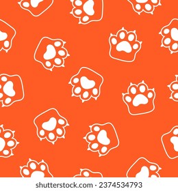 Orange seamless pattern with white paws