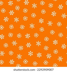 Orange seamless pattern with white snowflakes