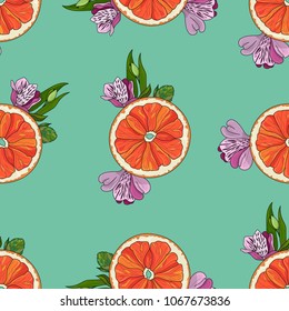 Orange slices with flowers seamless pattern on teal background
