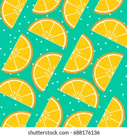 Orange slices with green background and white polka dots