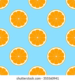 Orange slices on blue background seamless pattern