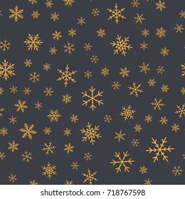 Orange snowflakes seamless pattern on grey Christmas background.