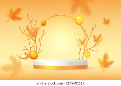 Orange stand podium with blurred leaves on background. Glowing stage with branch and leaf for sale banner. Autumn product display presentation.