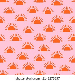 Sol naranja con fondo rosado sin costuras.