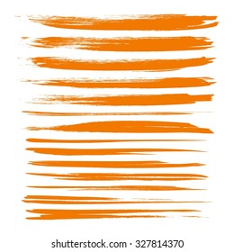 Orange textured long dry paint strokes set isolated on white background