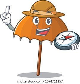 Orange umbrella an experienced explorer with a compass