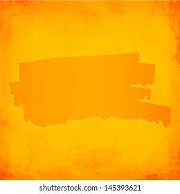Orange vector brush spot on grunge background