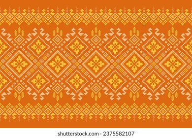 Orange vintages cross stitch traditional ethnic pattern paisley flower Ikat background abstract Aztec African Indonesian Indian seamless pattern for fabric print cloth dress carpet curtains and sarong