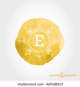 orange watercolor ring with letter