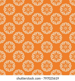 Orange and white floral ornament. Seamless pattern for textile and wallpapers