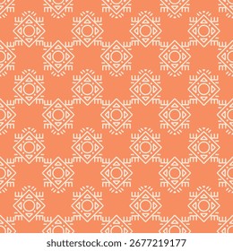 The orange and white patterned fabric has a tribal design. The pattern is made up of squares and circles