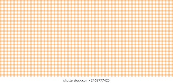 Orange and white plaid fabric texture as a background