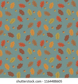 orange yellow, brown and beige oak tree leaves and accorn on blue green, seamless vector seasonal autumn background