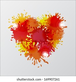 Orange and yellow heart made from paint splashes