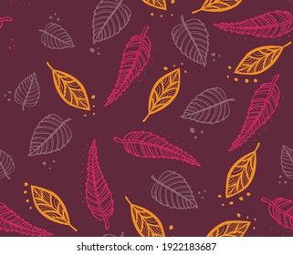 Orange and yellow leaves on a blue background. Seamless Pattern. Vector illustration