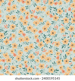 orange and yellow seamless floral vector small flowers leaves pattern on green background