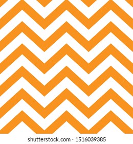 Orange zig zags vector seamless background. Halloween pattern. 
