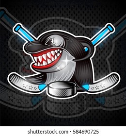 Orca face in profile with crossed sticks and hockey puck in teeth. Logo for any sport team or competition