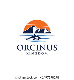 orca on the beach under the mountain -logo vector